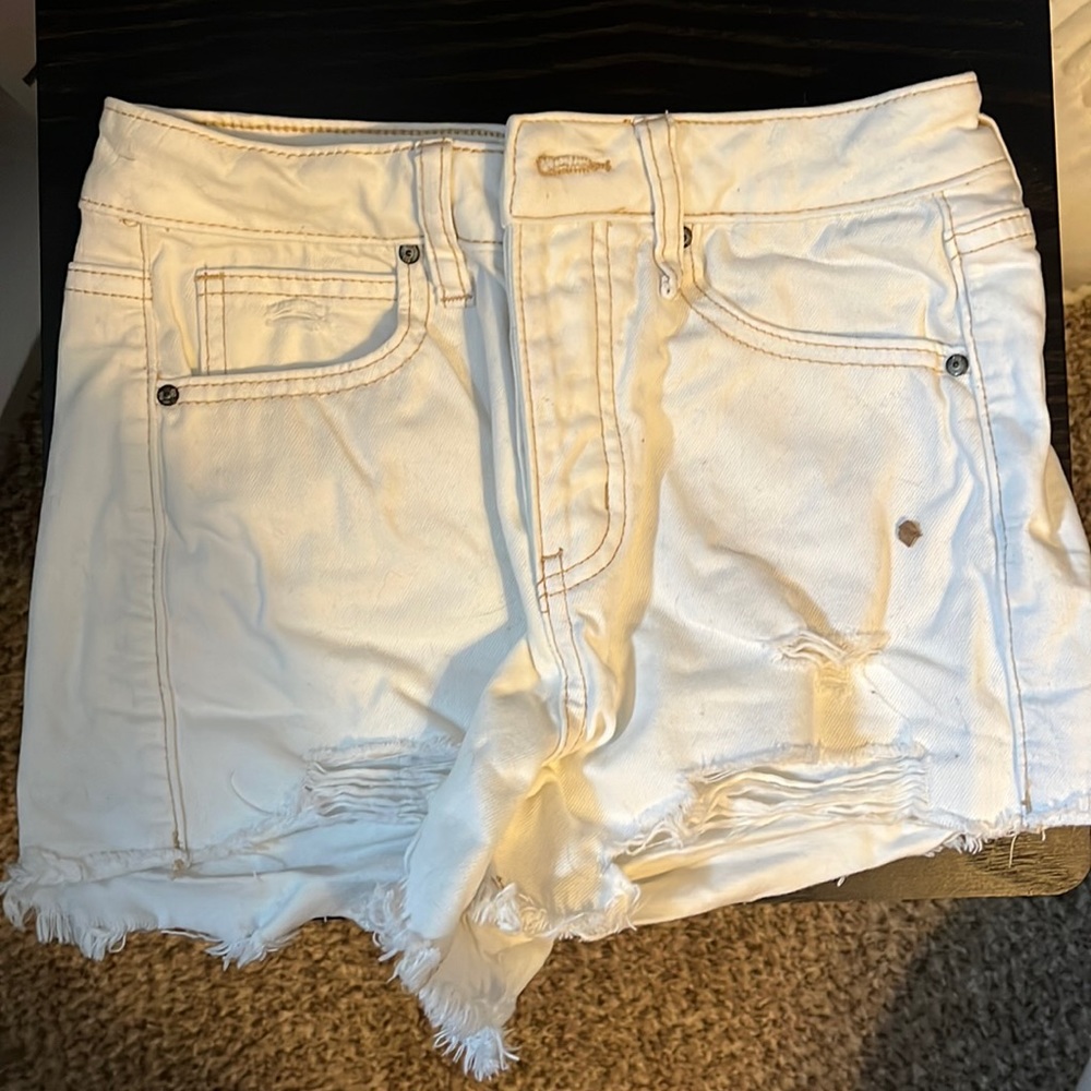 White jean shorts that are high waisted